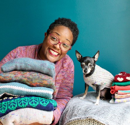 Dana and Jellybean and their hand knit sweaters