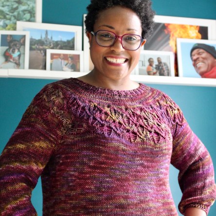 DWJ wearing a Love Note sweater