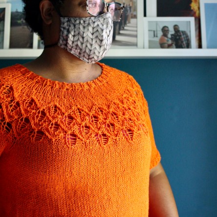 DWJ wearing a cotton Love Note sweater and face mask