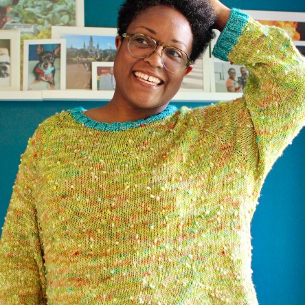 DWJ in a customized oversized sweater