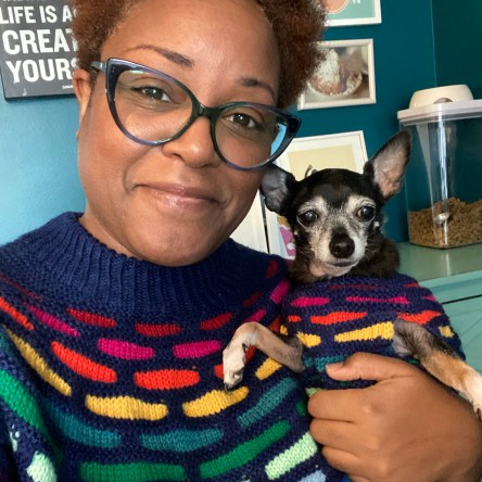 Dana and Jellybean in matching rainbow sweaters