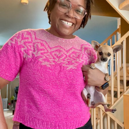 DWJ wearing Yesteryears sweater holding Kiwi