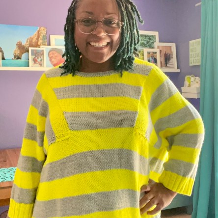 DWJ wearing the striped Oblique sweater